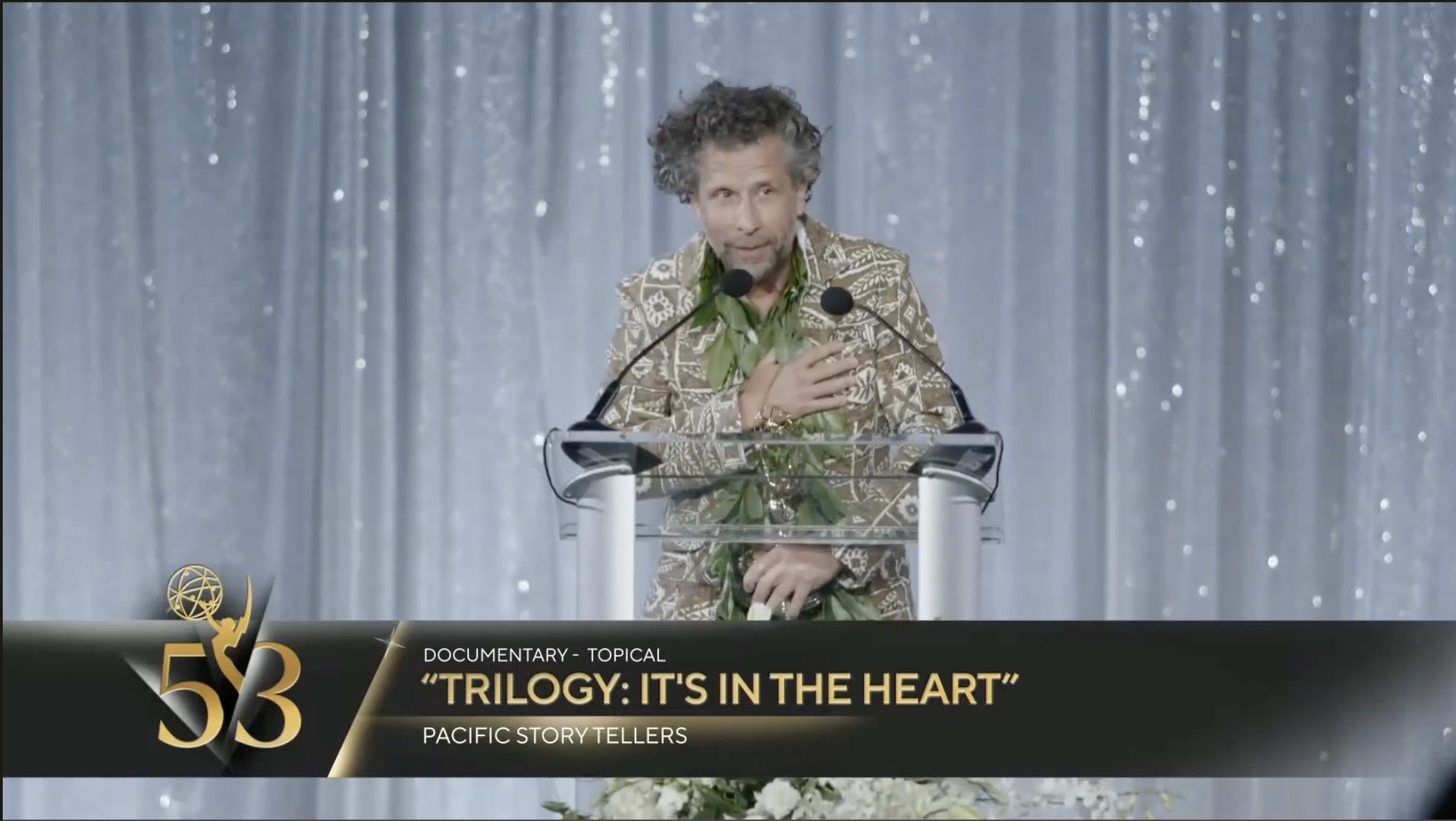 Stephan Boeker accepting the Emmy Award for Trilogy: It’s in the Heart