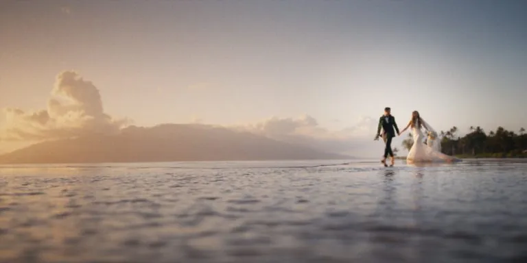 Madison and Brandon share an intimate moment during their cinematic Four Seasons Maui elopement.