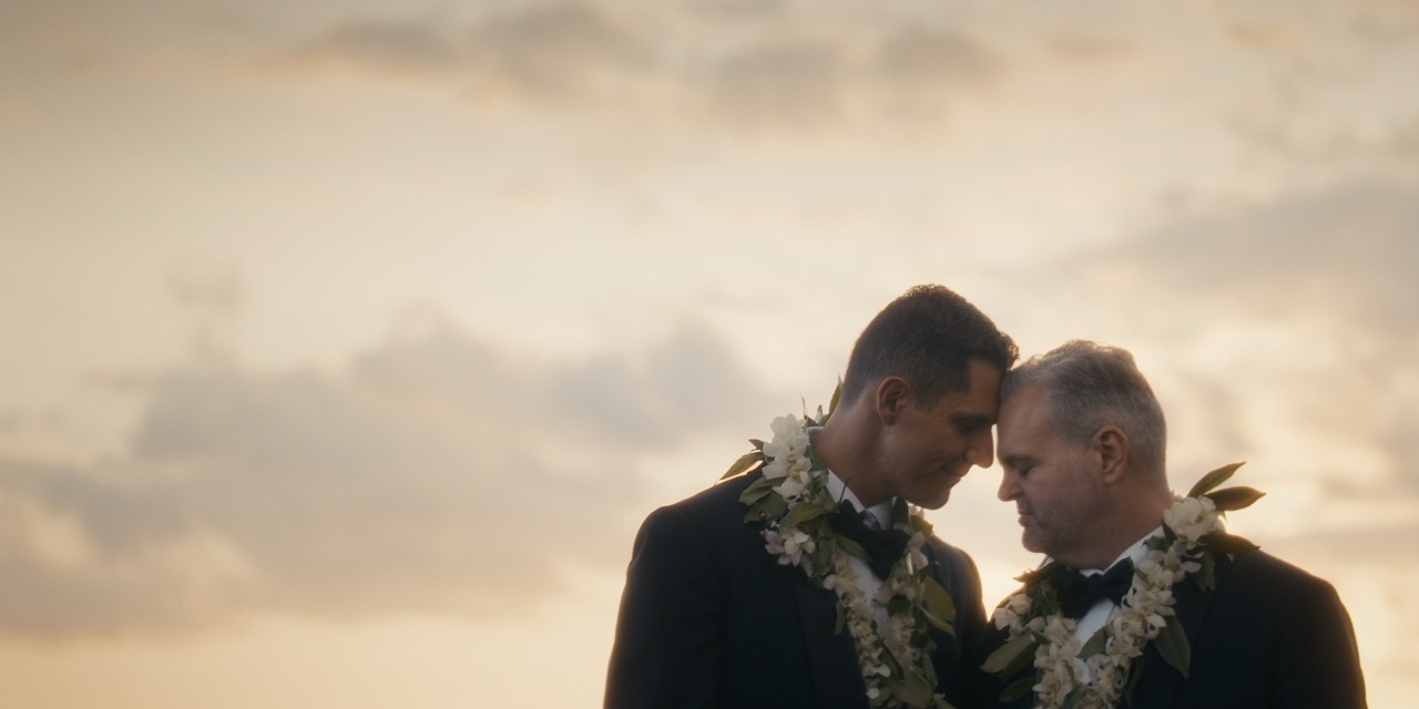 Jaime and Travis share a quiet forehead-to-forehead portrait at Four Seasons Resort Hualalai.